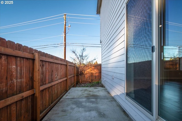 view of patio with fence