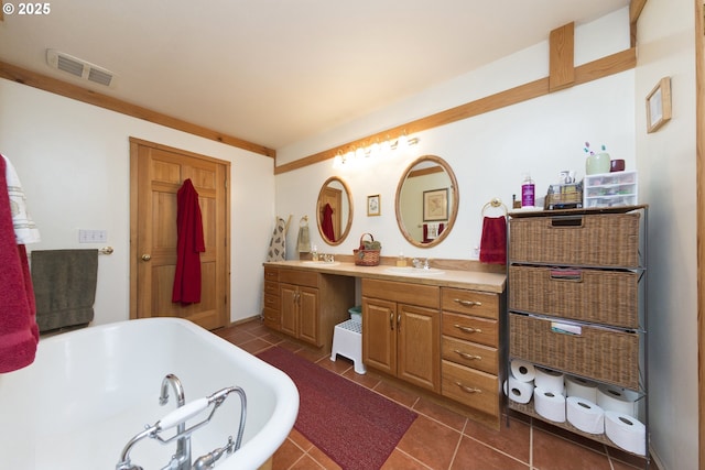 161 Acme Rd, White Salmon, WA 98672 - full bathroom with a bathtub, double vanity, and tile patterned flooring
