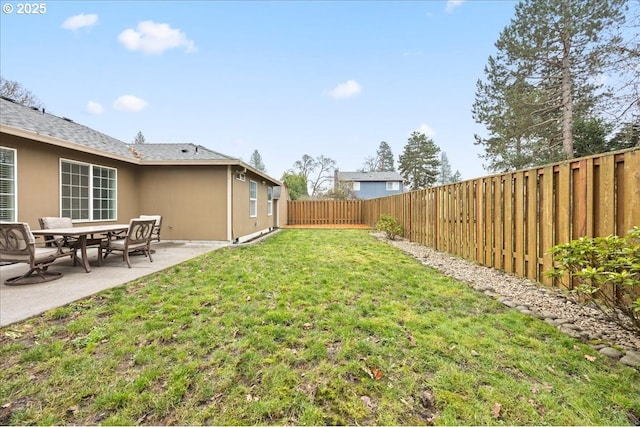 view of yard with a patio area