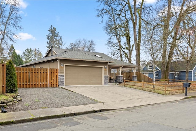 view of front of property with a garage