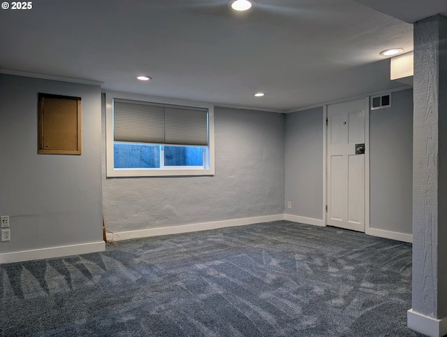 7035 NE Klickitat St NE, Portland, OR 97213 - below grade area featuring dark carpet, recessed lighting, and baseboards
