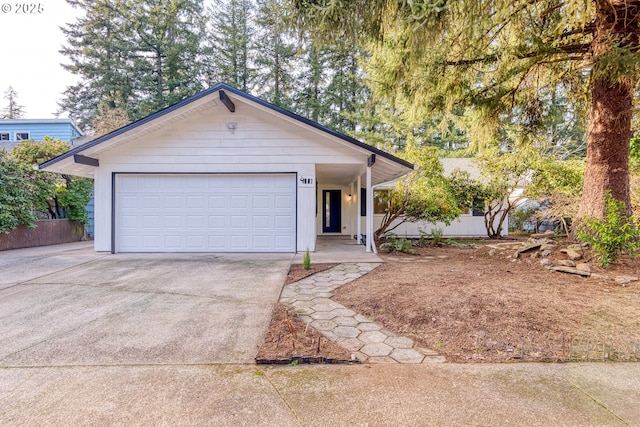 single story home featuring a garage