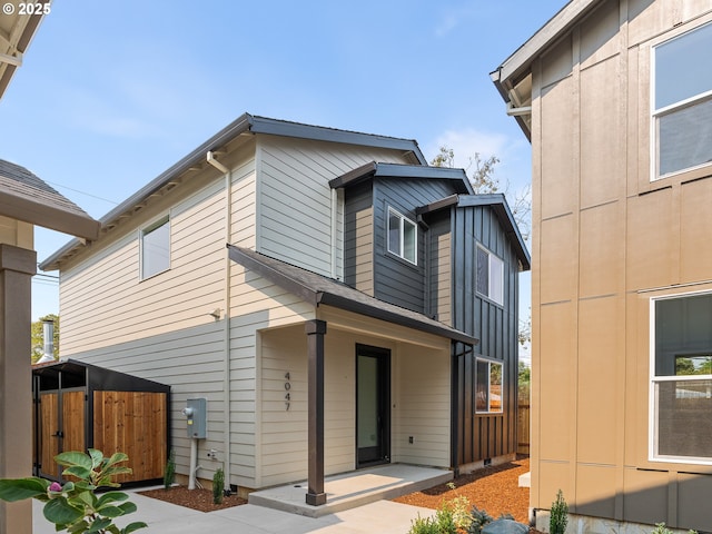4047 SE 115th Ave, Portland, OR 97266 - view of front of house with board and batten siding