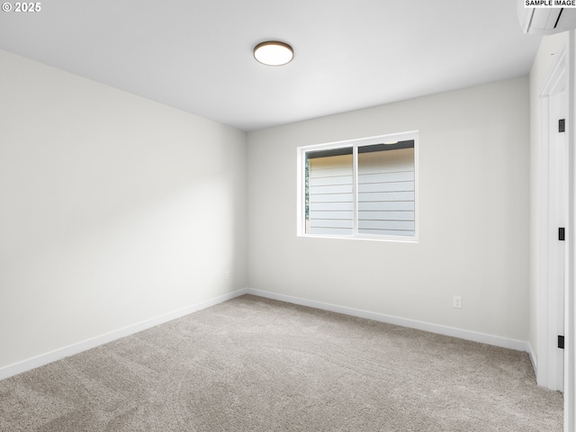 4047 SE 115th Ave, Portland, OR 97266 - empty room featuring carpet, baseboards, and a wall unit AC