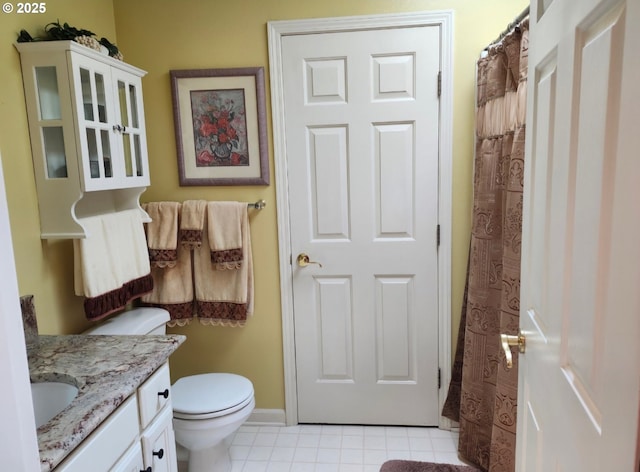 1270 Hidden Creek Dr, Keizer, OR 97303 - bathroom featuring tile patterned flooring, vanity, toilet, and baseboards