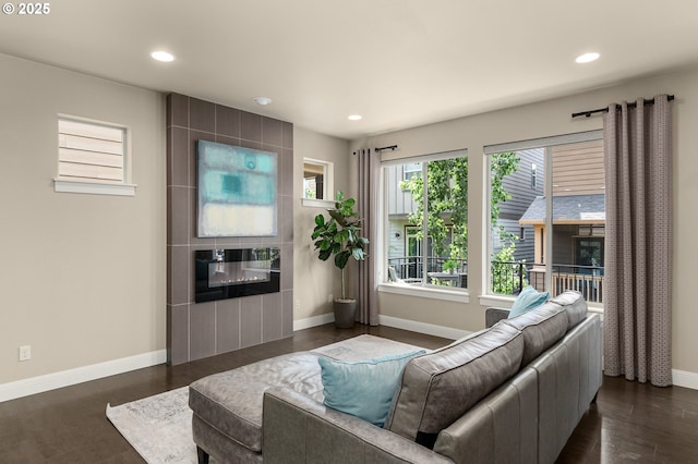 14152 SW Compass Dr, Beaverton, OR 97005 - living room with recessed lighting, a tile fireplace, and dark wood finished floors