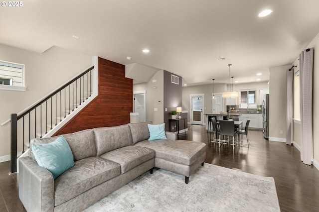 14152 SW Compass Dr, Beaverton, OR 97005 - living area with recessed lighting, dark wood-type flooring, and stairway