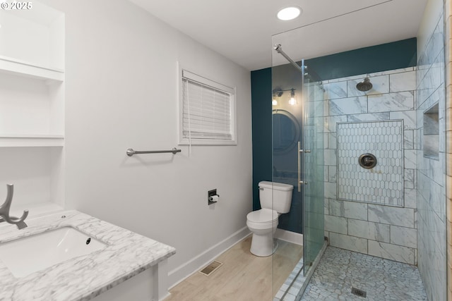 11744 SW 61st Ave, Portland, OR 97219 - full bathroom featuring a shower stall, vanity, recessed lighting, and wood finished floors
