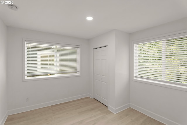 11744 SW 61st Ave, Portland, OR 97219 - unfurnished bedroom with light wood-style flooring, a closet, and recessed lighting