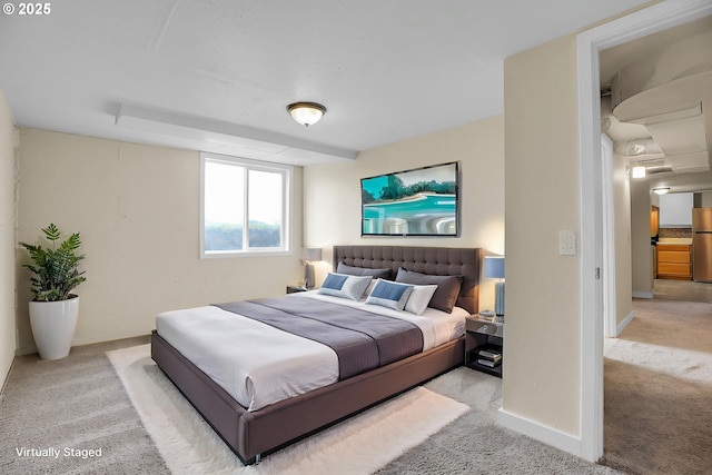 carpeted bedroom with baseboards