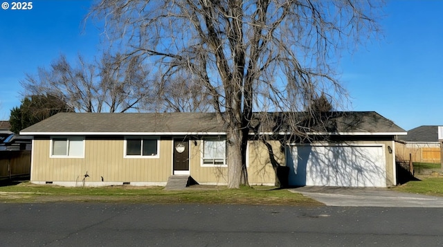 single story home with a garage