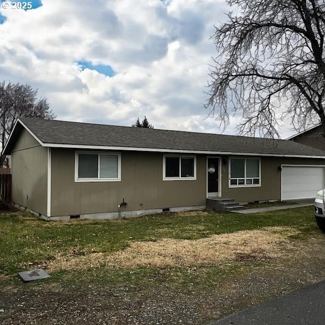 single story home featuring a garage