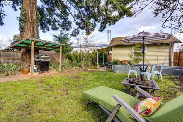 view of yard with a patio and fence