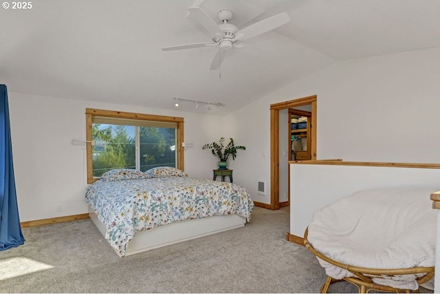 bedroom with ceiling fan, carpet flooring, vaulted ceiling, and access to exterior