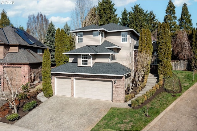 traditional home featuring driveway, brick siding, an attached garage, and roof with shingles