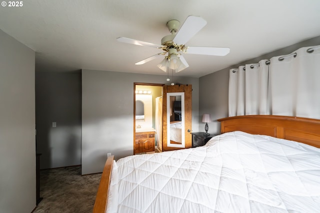 carpeted bedroom featuring ceiling fan and ensuite bathroom