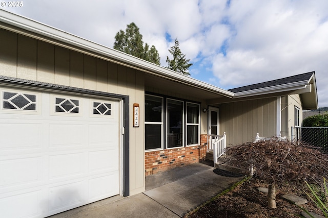 entrance to property featuring a garage