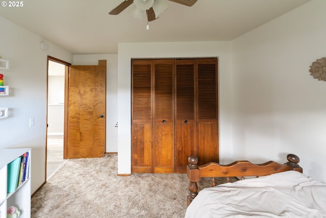 bedroom with light carpet, ceiling fan, and a closet