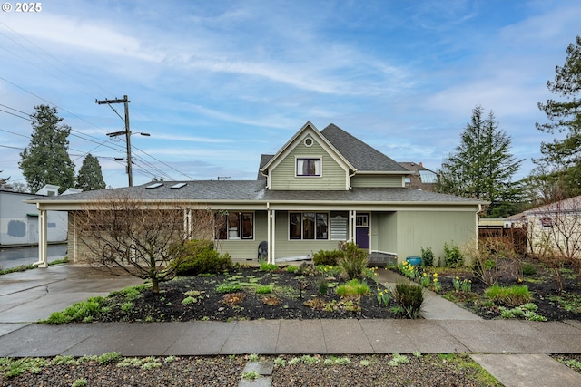 1034 Lawrence St, Eugene, OR 97401 - traditional-style house with covered porch and roof with shingles