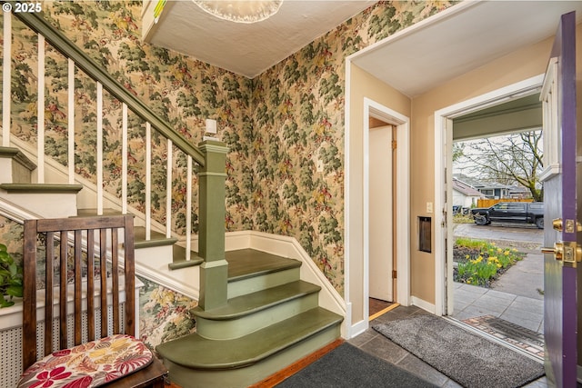 1034 Lawrence St, Eugene, OR 97401 - entrance foyer featuring wallpapered walls and stairway