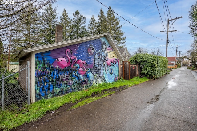 1034 Lawrence St, Eugene, OR 97401 - view of side of property with a chimney and brick siding