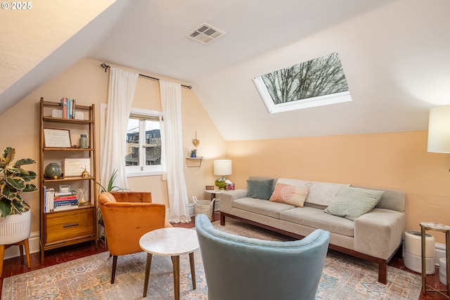 1034 Lawrence St, Eugene, OR 97401 - living room featuring lofted ceiling, wood finished floors, and a skylight