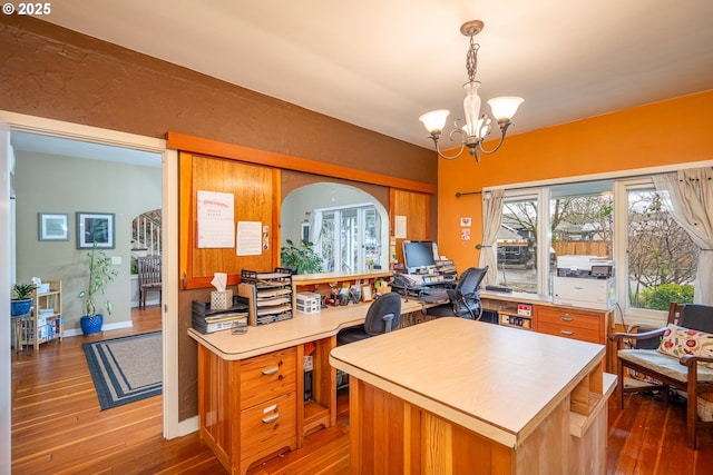 1034 Lawrence St, Eugene, OR 97401 - office space with wood-type flooring and a chandelier