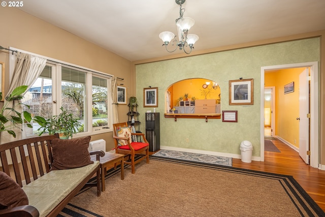 1034 Lawrence St, Eugene, OR 97401 - sitting room featuring wood finished floors and a chandelier