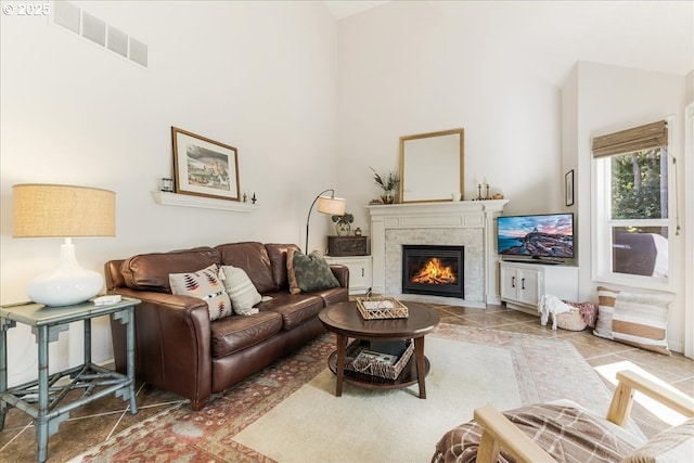 14940 SW Michael Ct, Sherwood, OR 97140 - living room featuring high vaulted ceiling and a fireplace with flush hearth