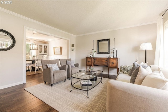 14940 SW Michael Ct, Sherwood, OR 97140 - living area featuring ornamental molding, wood-type flooring, and baseboards