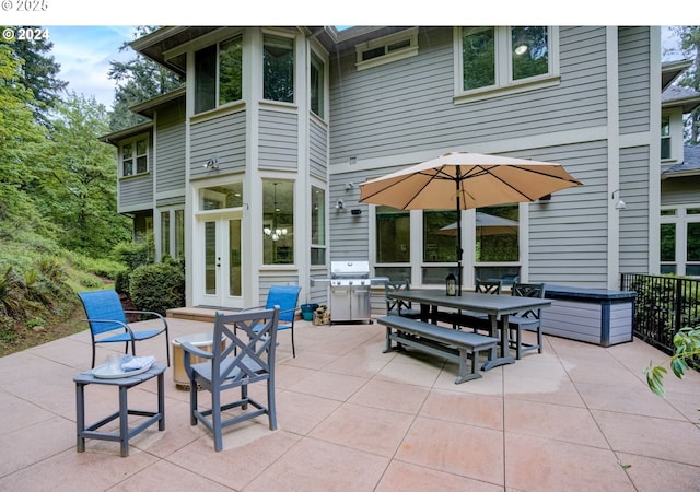 view of patio / terrace with french doors and outdoor dining area