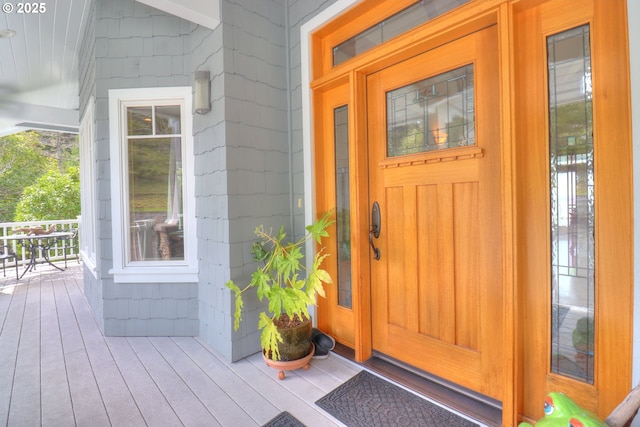 doorway to property featuring a porch