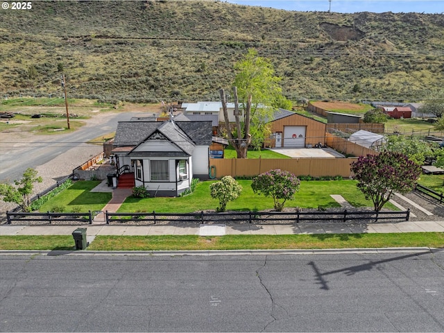 aerial view of property and surrounding area with a mountainous background