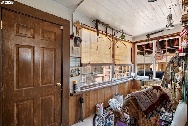 miscellaneous room featuring wood walls and wooden ceiling
