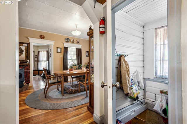 hall with hardwood / wood-style floors