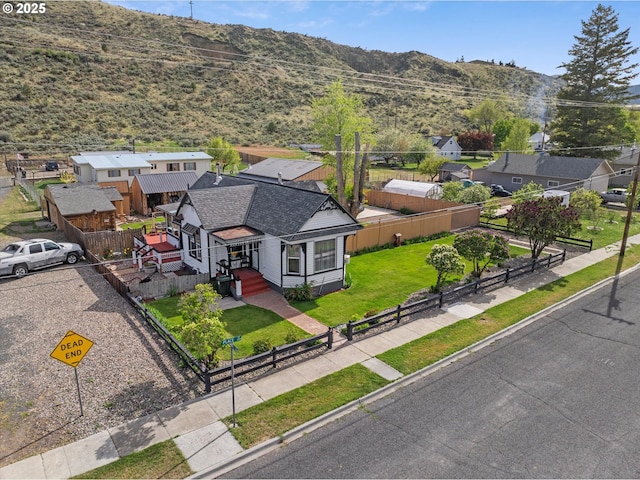 aerial perspective of suburban area with a mountain backdrop