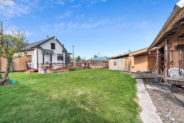 view of yard featuring a deck