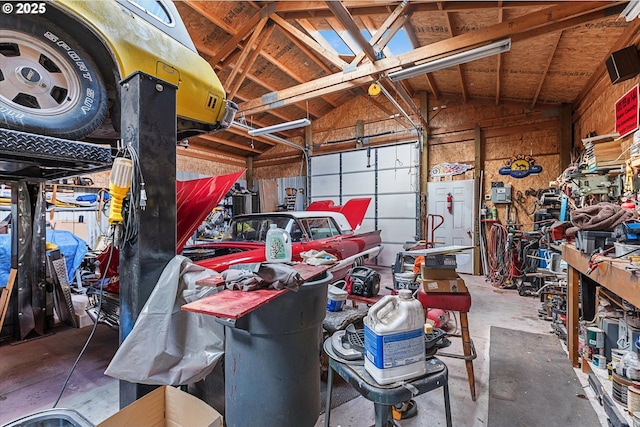 garage with a workshop area