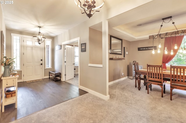 12130 SW Kelly Ln, Tigard, OR 97223 - dining room with a chandelier, baseboards, carpet, and a tray ceiling