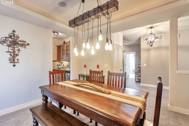 12130 SW Kelly Ln, Tigard, OR 97223 - carpeted dining area with a chandelier and baseboards