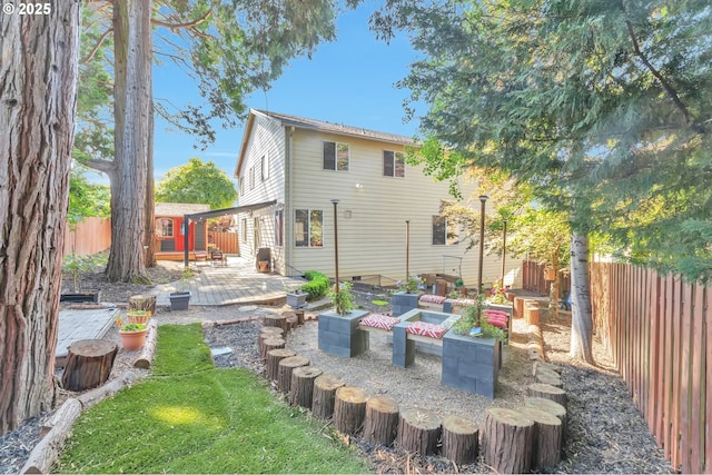 12130 SW Kelly Ln, Tigard, OR 97223 - back of property with a fenced backyard and a patio area