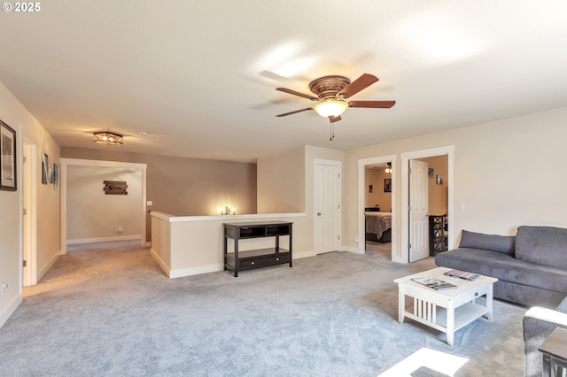 12130 SW Kelly Ln, Tigard, OR 97223 - carpeted living room featuring ceiling fan and baseboards