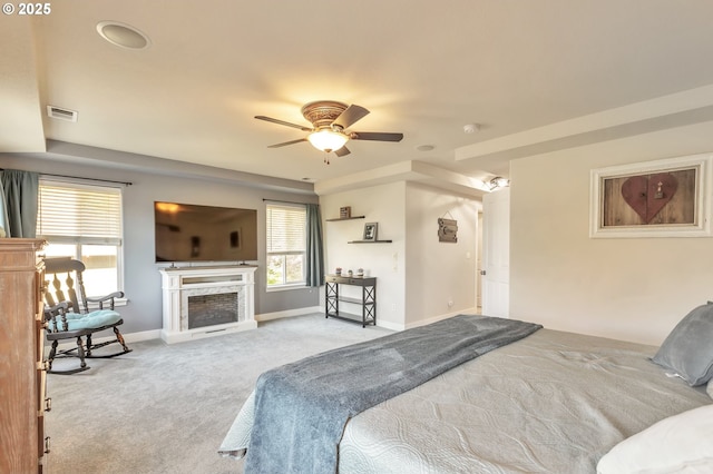 12130 SW Kelly Ln, Tigard, OR 97223 - carpeted bedroom with a fireplace and baseboards