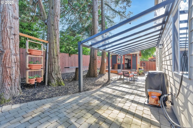 12130 SW Kelly Ln, Tigard, OR 97223 - fenced backyard featuring a patio area
