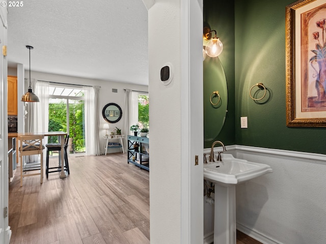 17717 NE 26th St, Vancouver, WA 98684 - bathroom featuring wood finished floors and a textured wall