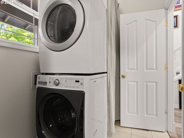 17717 NE 26th St, Vancouver, WA 98684 - laundry area with estacked washer and dryer and light tile patterned flooring