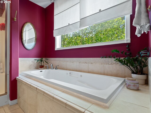 17717 NE 26th St, Vancouver, WA 98684 - bathroom with a garden tub and tile patterned flooring
