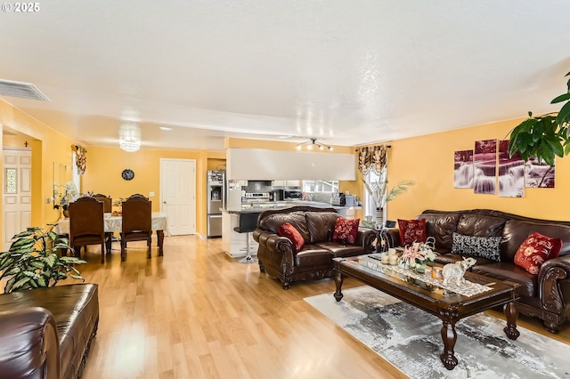17180 NW Joscelyn St, Beaverton, OR 97006 - living room featuring light wood-style floors