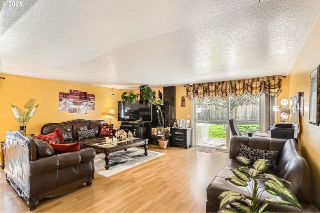 17180 NW Joscelyn St, Beaverton, OR 97006 - living room featuring a textured ceiling and wood finished floors