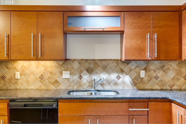 kitchen featuring dark stone counters, black dishwasher, sink, and backsplash